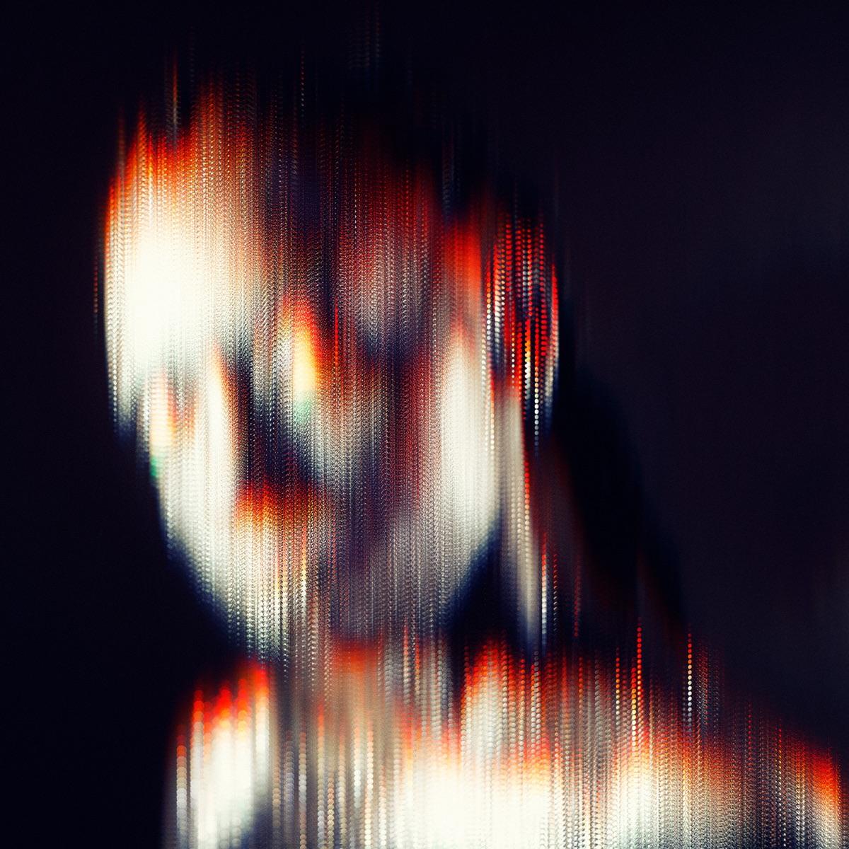 Lyric cover art as blurred background